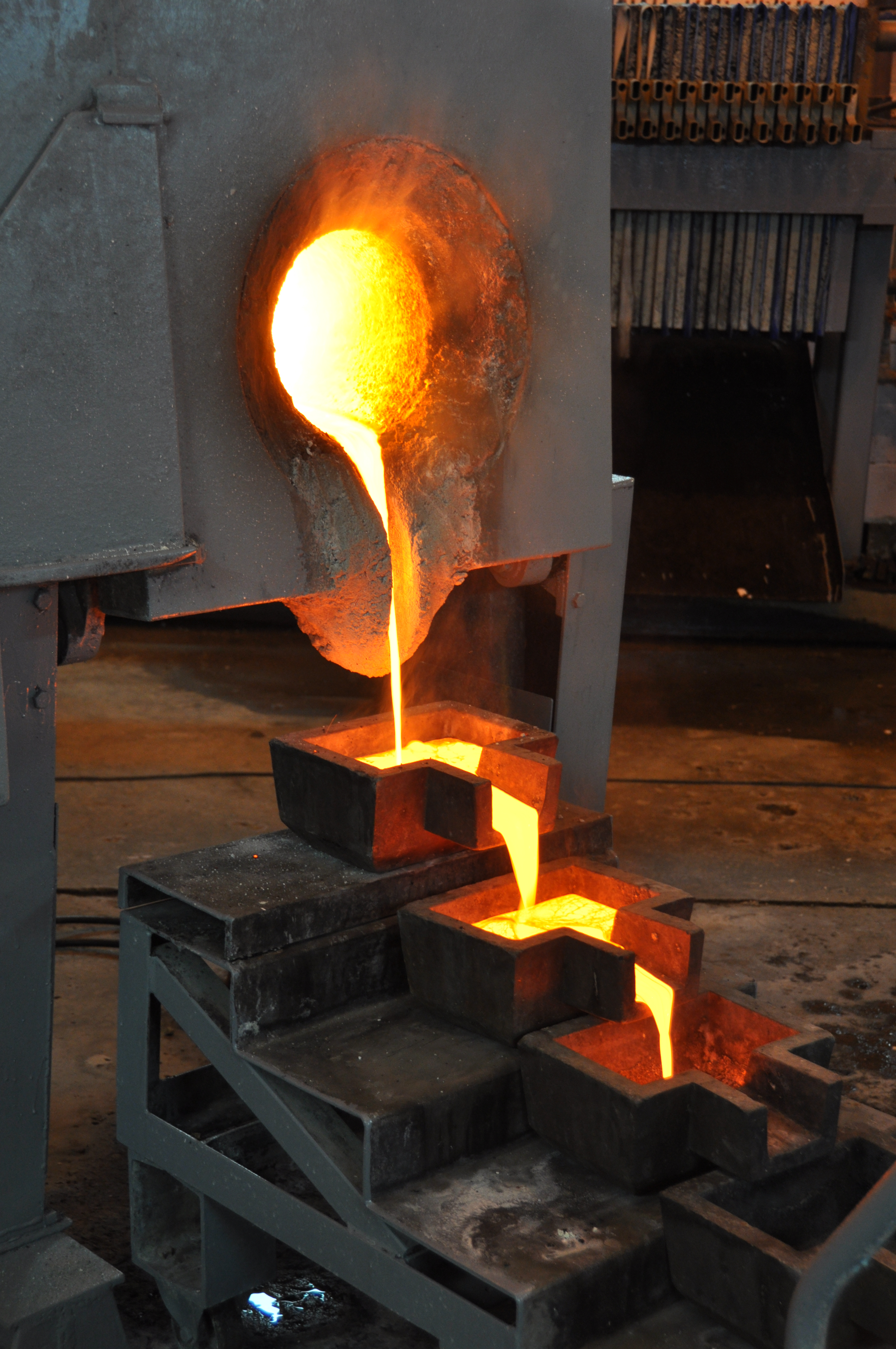 Gold being melted in a refinery furnace